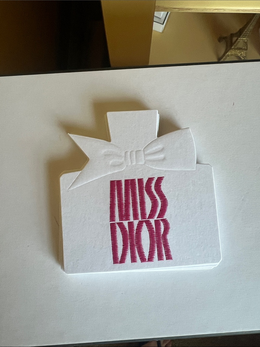 Dior White Perfume Bottle Card with Fuchsia Logo